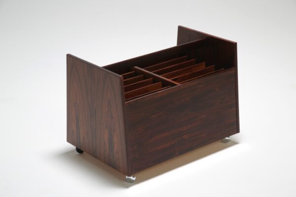 a rosewood magazine holder by rolf hesland for bruksbo.