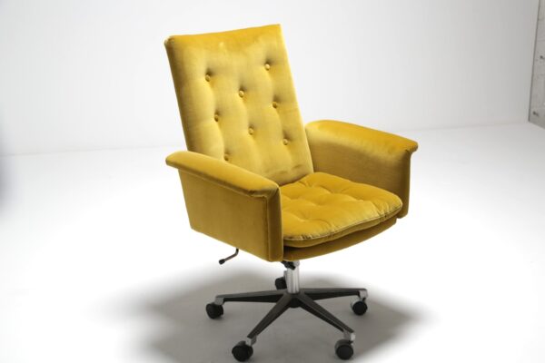 a gold cotton velvet covered 1960s office chair