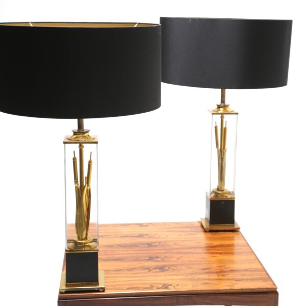 a pair of decorator lamps with bullrush design.