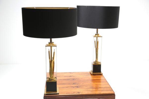 a pair of decorator lamps with bullrush design.