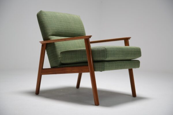 Vintage teak armchair with green tweed fabric.