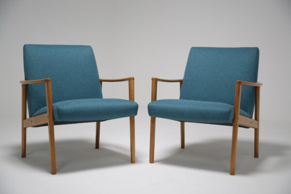 Vintage Scandinavian oak open armchairs.