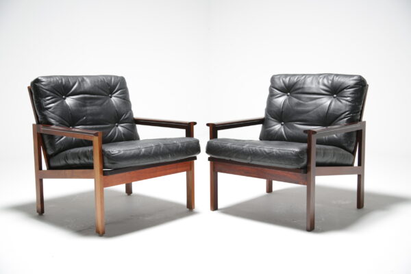 Pair of Illum Wikkelso "Capella" rosewood armchairs.