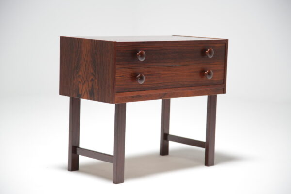 A rosewood two drawer bedside table or hall table.