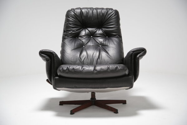 Black leather swivel armchair