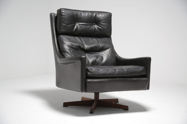 Black leather swivel armchair