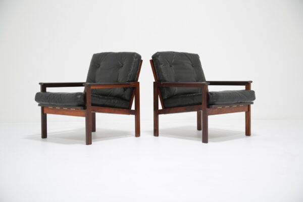 Vintage Pair of Danish Black Leather and Rosewood Lounge Armchairs "Capella" by Illum Wikkelso for N. Nilersen, 1960s.
