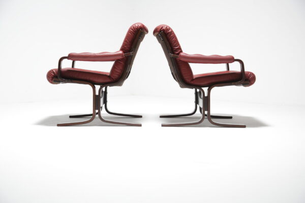 Vintage Pair of Red Leather and Beechwood Cantilever Lounge Chairs, Norway, 1970s.